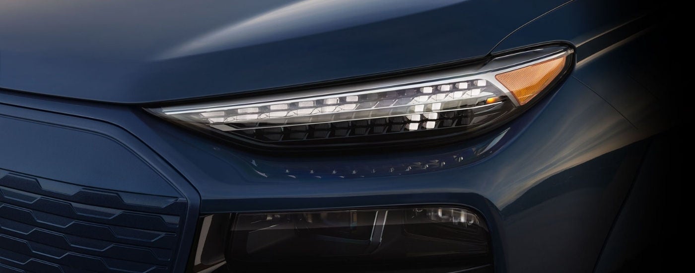 Headlight on a black 2024 Audi Q6 e-tron.